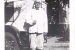 Black and white photograph of an ice cream salesman and his Good Humor truck.