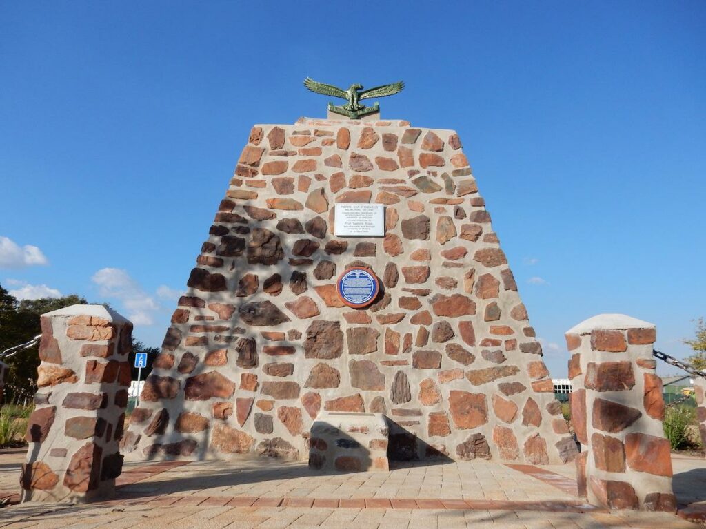 An image of a multi-colored stone monument 